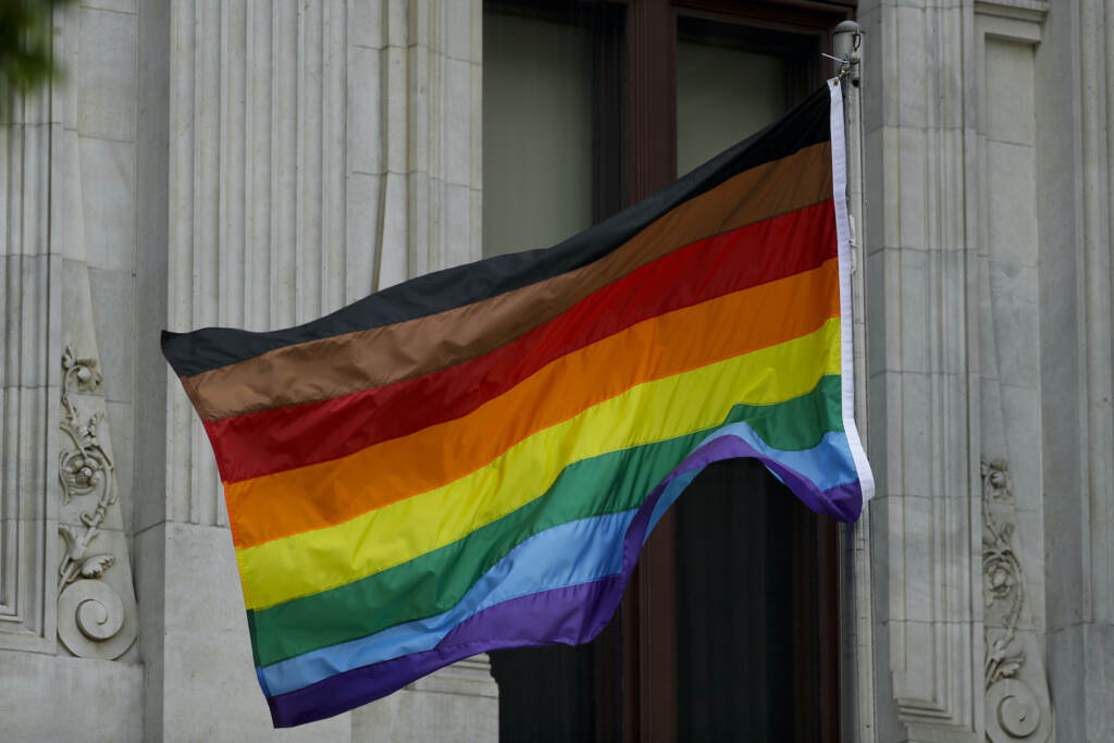Discrimination Pennsylvania Law FILE - Philadelphia's altered gay pride flag is seen outside City Hall on June 19, 2017, in Philadelphia. Pennsylvania government regulations would be revised with extensive definitions of sex, religious creed and race under a proposal set for a vote on Thursday, Dec. 8, 2022 — a change some Republican lawmakers see as an overreach on a subject they think should not be addressed without legislation. (AP Photo/Matt Slocum, File)