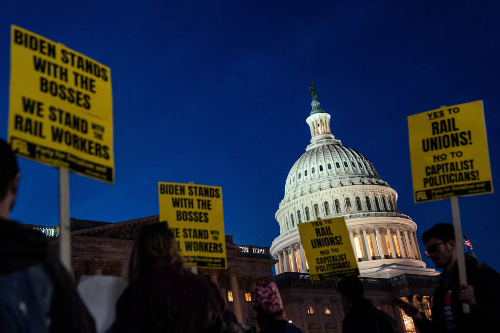 Activists in support of unionized rail workers protest outside the House side of the Capitol on Tuesday. Activists in support of unionized rail workers protest outside the House side of the Capitol on Tuesday. (Kent Nishimura/Los Angeles Times via Getty Images)