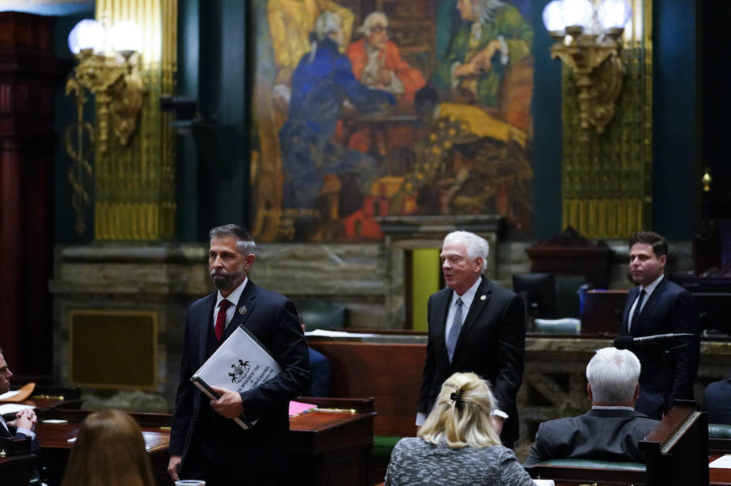 Philadelphia Prosecutor Pennsylvania state House of Representatives' impeachment managers Reps. Craig Williams, left, Tim Bonner, and Jared Solomon depart after delivering articles of impeachment against Philadelphia's Democratic district attorney, Larry Krasner, to the Senate chamber at the Pennsylvania Capitol in Harrisburg, Pa., Wednesday, Nov. 30, 2022. House Republicans earlier this month approved seven articles of impeachment, which will be heard in a Senate trial. (AP Photo/Matt Rourke)