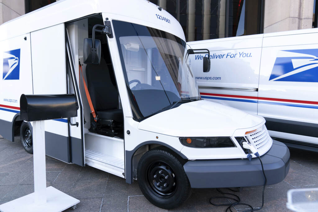 Louis DeJoy U.S. Postal Service electric vehicles are seen as Postmaster General of the United States of America Louis DeJoy announces the Postal Service will sharply increase the number of electric-powered delivery trucks in its fleet and will go all-electric for new purchases starting in 2026. (AP Photo/Jose Luis Magana)