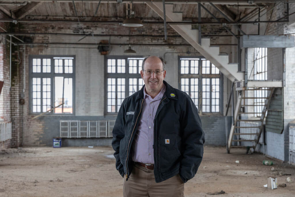 01 25 2023 k paynter developer ken weinstein wayne junction Developer Ken Weinstein inside the former Arguto Oilless Bearing Company and most recently a church building, that he plans to restore and turn into offices. (Kimberly Paynter/WHYY)
