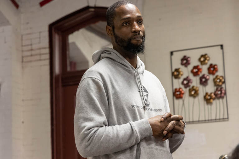 Tyrique Glasgow, Founder of the Young Chances Foundation, lead a meeting to talk about alternatives to Stop and Frisk policing policy at a public meeting in a South Philadelphia Church on January 25, 2023. (Kimberly Paynter/WHYY)