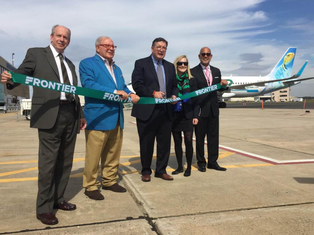 2017 10-05 Mercer County Faebook Page_Ribbon Cutting at Trenton-Mercer Airport County officials including County Executive Brian Hughes, at a ribbon cutting to welcome Frontier Airlines to Trenton-Mercer Airport in 2017
