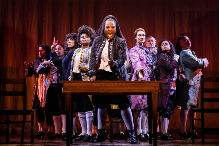 The cast of ''1776'' (from left) Sushma Saha, Sara Porkalob, Mehry Eslaminia, Gisela Adisa, Crystal Lucas-Perry, Elizabeth A. Davis, Becca Ayers, Brooke Simpson, and Oneika Phillips