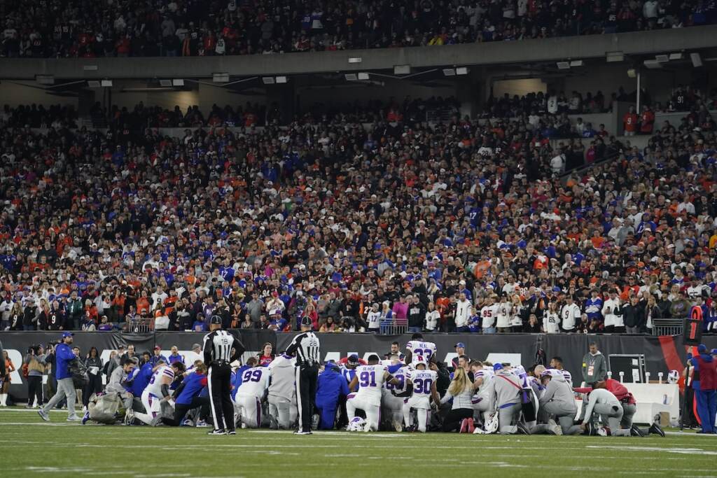 Bills Bengals Football The Buffalo Bills players pray for teammate Damar Hamlin during the first half of an NFL football game against the Cincinnati Bengals, Monday, Jan. 2, 2023, in Cincinnati. (AP Photo/Jeff Dean)