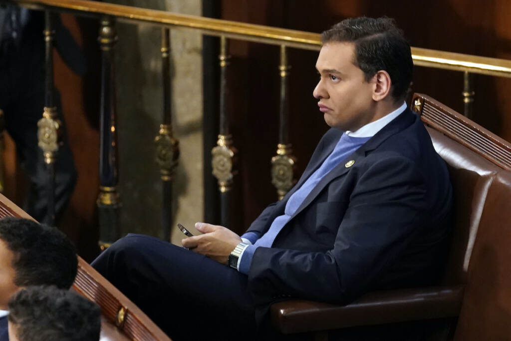 Congress Rep.-elect George Santos, R-N.Y. sits in the chamber during opening day of the 118th Congress at the U.S. Capitol, Tuesday, Jan 3, 2023, in Washington. (AP Photo/Andrew Harnik)