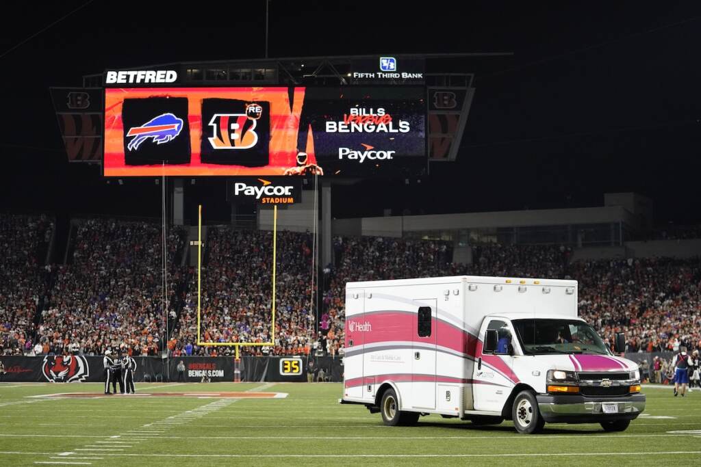 An ambulance leaves the field with Buffalo Bills' Damar Hamlin during the first half of an NFL football game between the Bills and the Cincinnati Bengals, Monday, Jan. 2, 2023, in Cincinnati