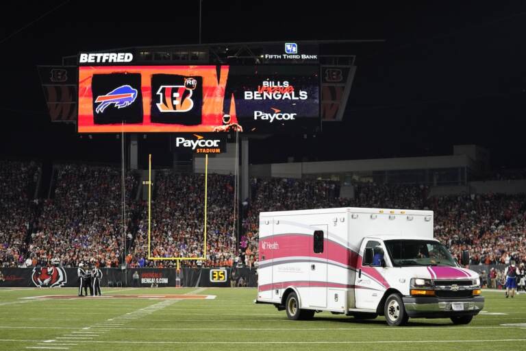 An ambulance leaves the field with Buffalo Bills' Damar Hamlin during the first half of an NFL football game between the Bills and the Cincinnati Bengals, Monday, Jan. 2, 2023, in Cincinnati