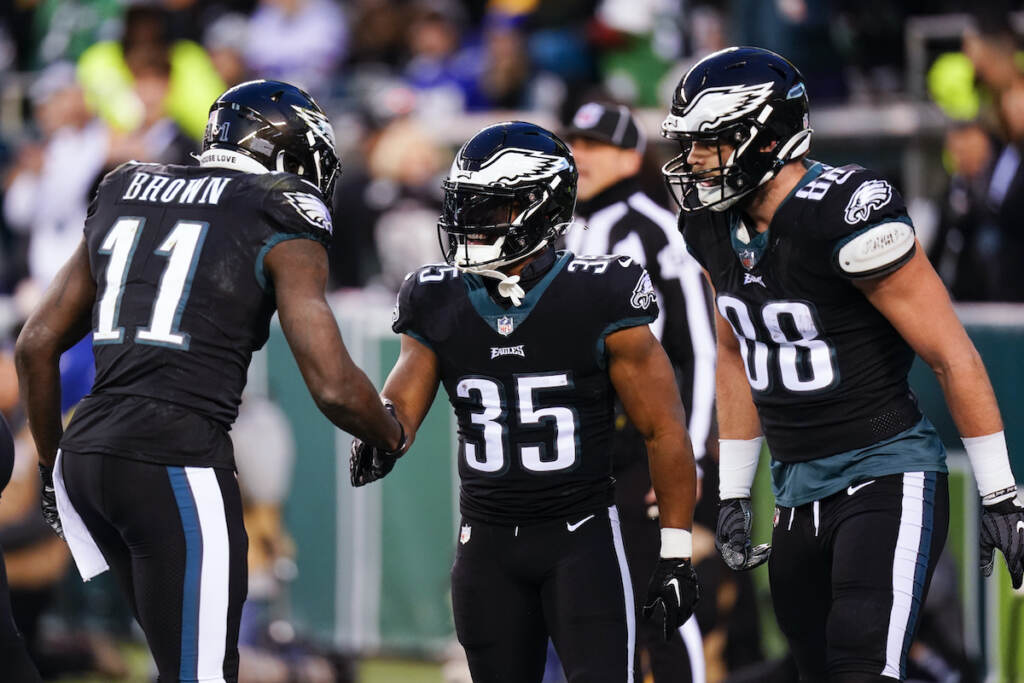 Giants Eagles Football Philadelphia Eagles running back Boston Scott (35) celebrates his touchdown run with wide receiver A.J. Brown (11) and tight end Dallas Goedert (88) during the first half of an NFL football game against the New York Giants, Sunday, Jan. 8, 2023, in Philadelphia