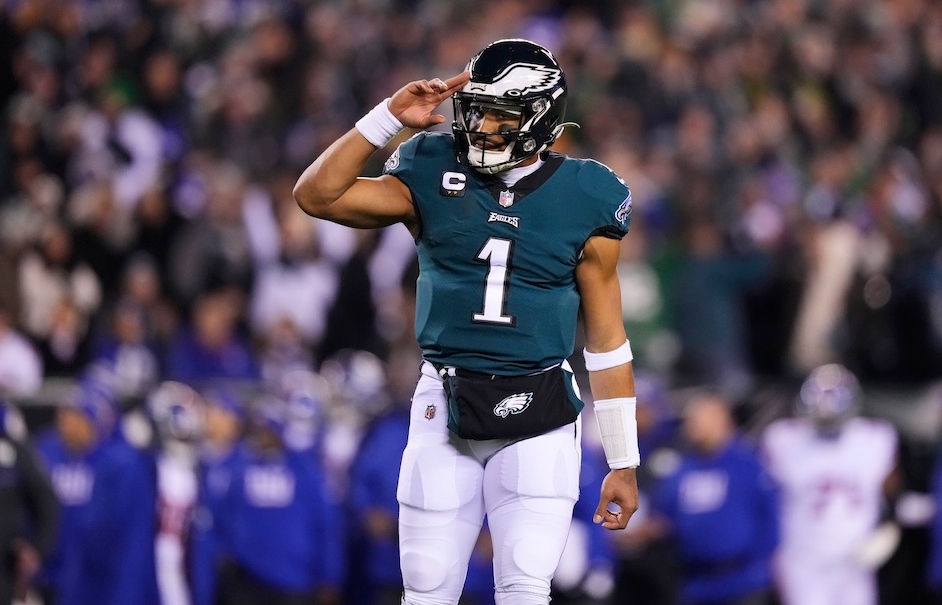 Philadelphia Eagles quarterback Jalen Hurts Philadelphia Eagles quarterback Jalen Hurts reacts after throwing a touchdown pass to wide receiver DeVonta Smith