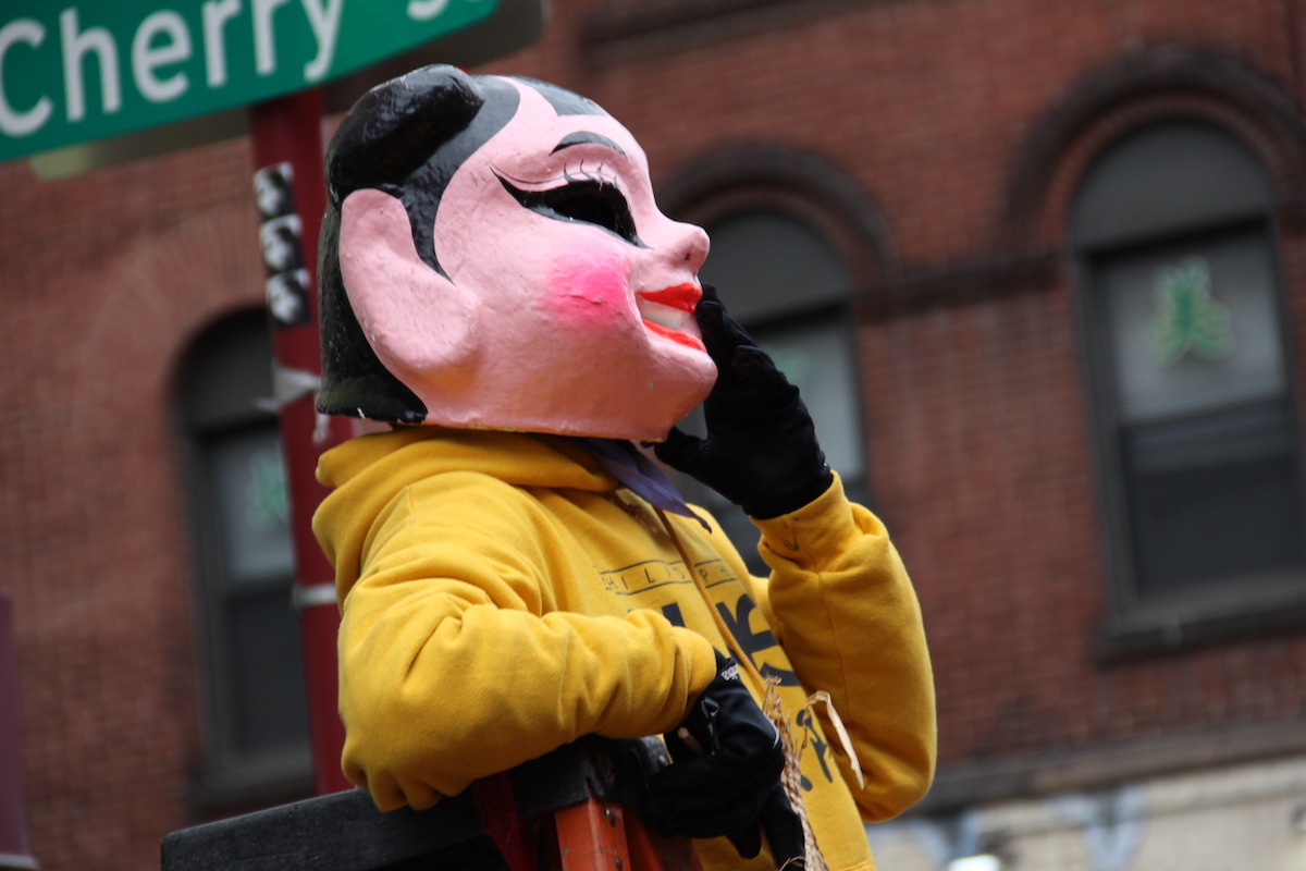 Generations of Philadelphians celebrated the Lunar New Year with music, fireworks, and dancing lions through the streets of Chinatown on Jan. 22, 2023. (Cory Sharber/WHYY)