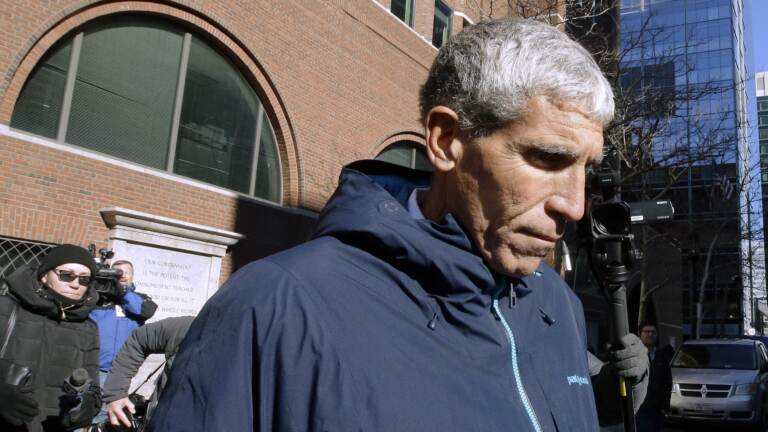 Rick Singer departs federal court in Boston in March 2019 after pleading guilty to charges in a nationwide college admissions bribery scandal. Singer is scheduled to be sentenced Wednesday afternoon in Boston. (Steven Senne/AP)