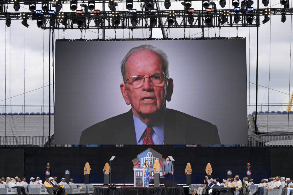 Hall of Fame Football A video of NFL official Art McNally is played during an induction ceremony at the Pro Football Hall of Fame