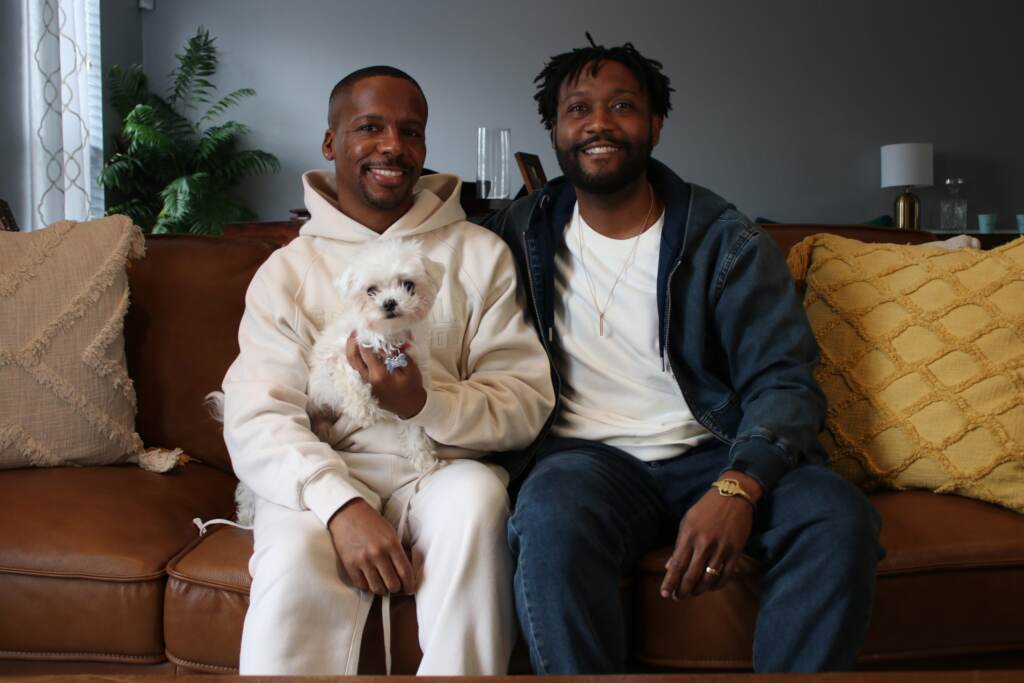 birdseed-housing-01-scaled Harry Christian III and Tony Keith Jr sitting in their home.