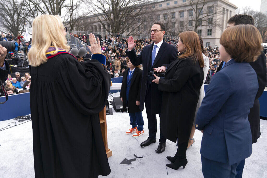 Pennsylvania Governor Inauguration Debra Todd, seen from behind, administers the oath of office to Gov. Josh Shapiro.