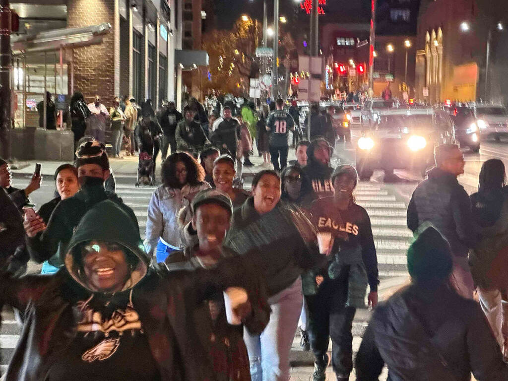 Fans pour onto North Broad Street, with many heading toward City Hall. (Mark Henninger/Imagic Digital)
