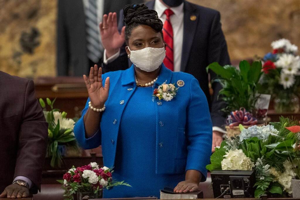 Joanna McClinton raises her hand