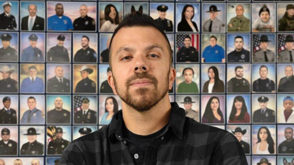 jonnycastro-artist-1024×576 A photo of a man in front of a series of other portraits in the background.