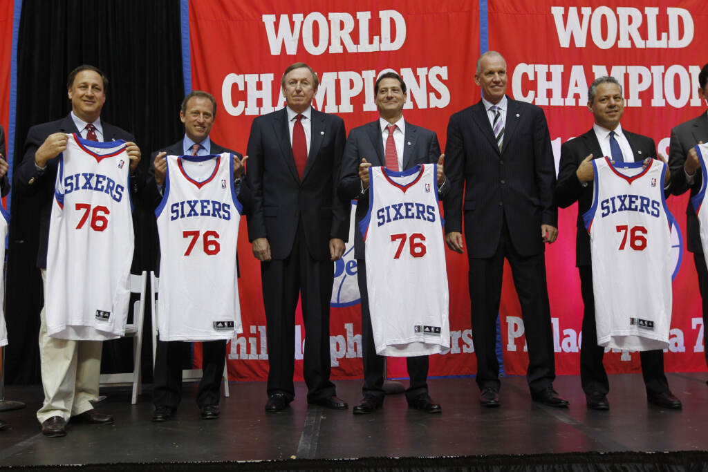Joshua Harris, Adam Aron, Rod Thorn, Doug Collins, David Blitzer, Art Wrubel From left, Philadelphia 76ers Chief Executive Officer Adam Aron, owner Joshua Harris, president Rod Thorn, owner David Blitzer, coach Doug Collins, and owner Art Wrubel, poses for photographs during a news conference at the Palestra Tuesday, Oct. 18, 2011, in Philadelphia. The sale of the team ends Comcast-Spectacor's 15-year run of ownership. (AP Photo/Matt Rourke)