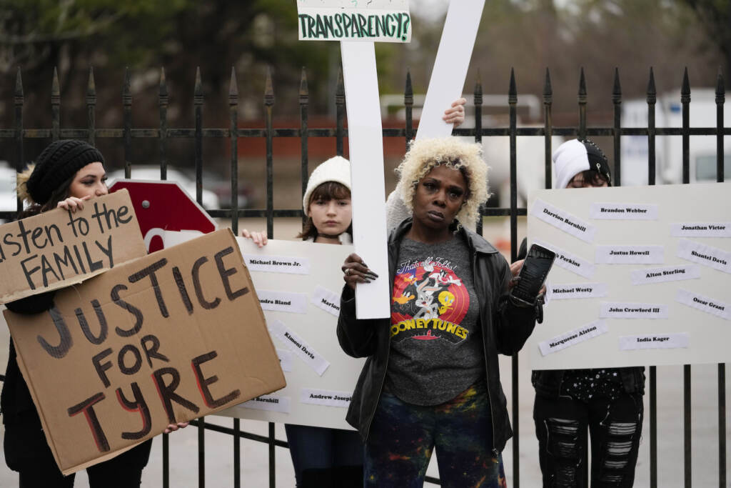 Memphis Police Force Investigation A group of demonstrators protest outside a police precinct in response to the death of Tyre Nichols, who died after being beaten by Memphis police officers, in Memphis, Tenn., Sunday, Jan. 29, 2023. (AP Photo/Gerald Herbert)