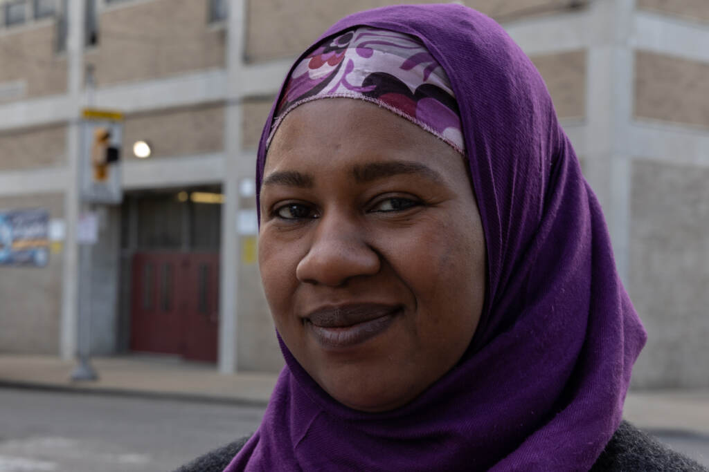 Haajar Abdullah-Aziz outside Robert Morris Elementary School in Philadelphia. (Kimberly Paynter/WHYY)
