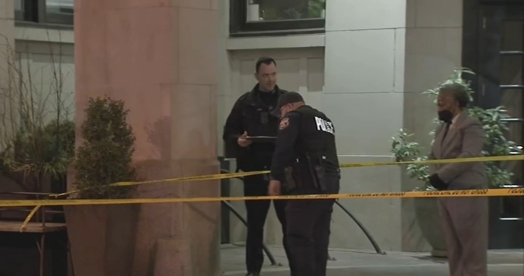 Police inspect an area in Center City, cordoned off with Police tape