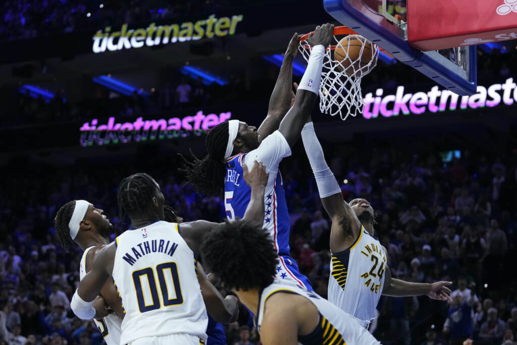 Philadelphia 76ers' Montrezl Harrell (5) dunks against Indiana Pacers' Buddy Hield (24) during overtime in an NBA basketball game, Wednesday, Jan. 4, 2023, in Philadelphia. (AP Photo/Matt Slocum)