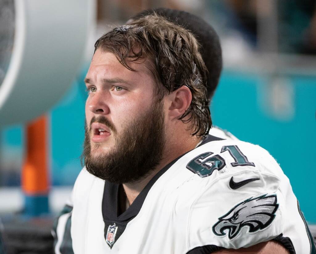 AP22243011195547 (1) Philadelphia Eagles guard Josh Sills (61) sits on the sidelines