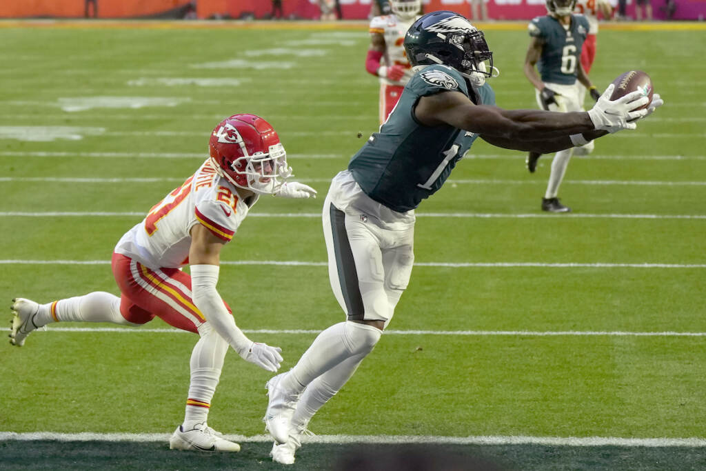 Trent McDuffie, A.J. Brown Philadelphia Eagles wide receiver A.J. Brown (11) makes the touchdown catch against Kansas City Chiefs cornerback Trent McDuffie (21) during the first half of the NFL Super Bowl 57 football game between the Kansas City Chiefs and the Philadelphia Eagles, Sunday, Feb. 12, 2023, in Glendale, Ariz. (AP Photo/Seth Wenig)