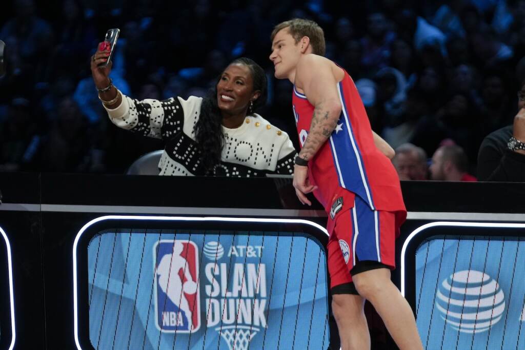 All Star Weekend Basketball Lisa Leslie takes a selfie with Mac McClung of the Philadelphia 76ers during the slam dunk competition of the NBA basketball All-Star weekend
