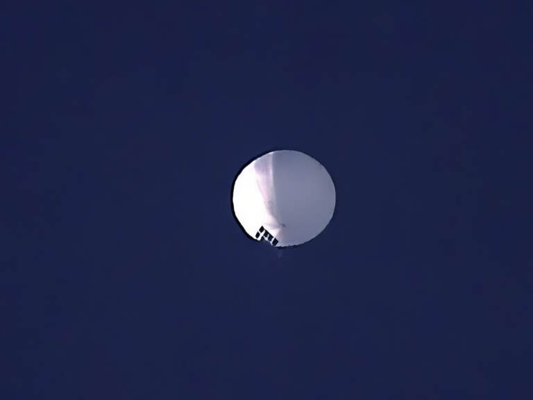 An image of a spy balloon in the sky