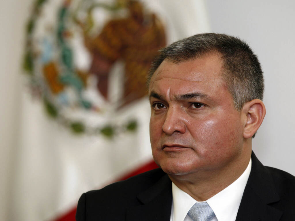 Mexico’s Secretary of Public Safety Genaro García Luna attends a news conference on the sidelines of an American Police Community meeting in Mexico City, Oct. 8, 2010. The former Mexican presidential cabinet member was convicted in the U.S. on Tuesday of taking massive bribes to protect the violent drug cartels he was tasked with combating. Mexico's Secretary of Public Safety Genaro García Luna attends a news conference on the sidelines of an American Police Community meeting in Mexico City,