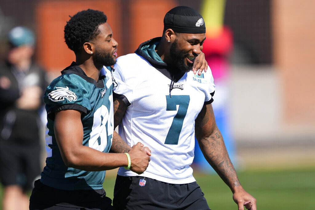 Super Bowl Eagles Football Two Eagles players walking on the field