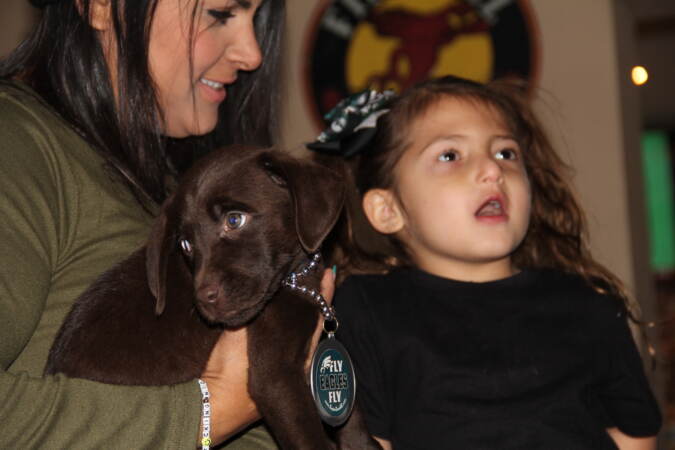 Some of the fan club's furry friends were on hand to root for the Eagles on Friday. (Cory Sharber/WHYY)