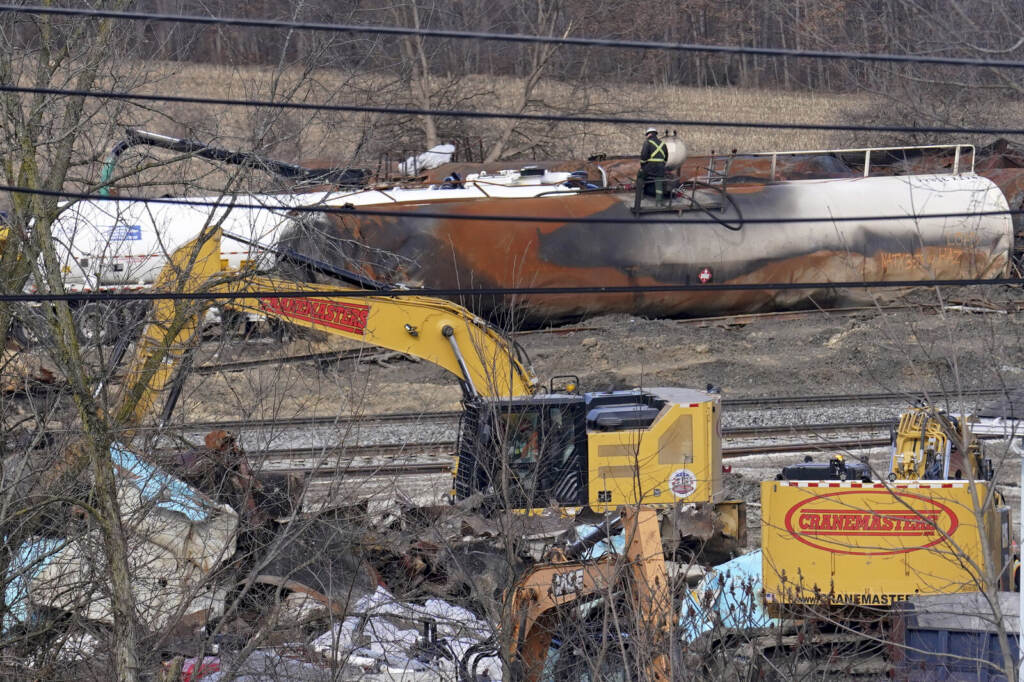 A view of workers cleaning up the train derailment near East Palestine, Ohio.
