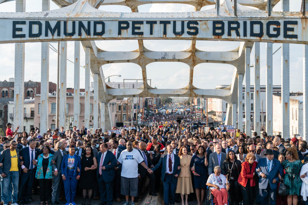 Vice President Harris (center) marches across the Edmund Pettus Bridge on March 6, 2022, in Selma, Ala., to commemorate the 57th anniversary of Bloody Sunday. Vice President Harris (center) marches across the Edmund Pettus Bridge on March 6, 2022, in Selma, Ala., to commemorate the 57th anniversary of Bloody Sunday. (Elijah Nouvelage/AFP via Getty Images)