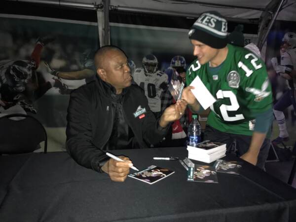 Auerbach had former Eagles quarterback Randall Cunningham sign a jersey in 2019. (Courtesy of Matt Auerbach)