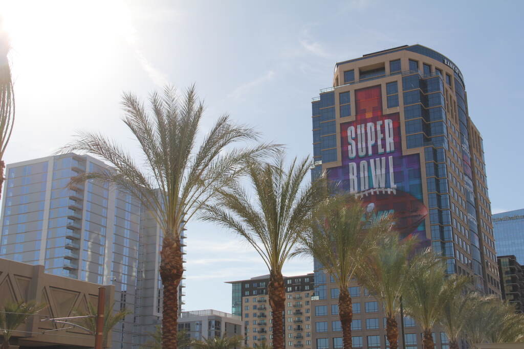 phoenix-super-bowl-eagles-1 Palm trees and a sign that reads Super Bowl on a skyscraper are visible.