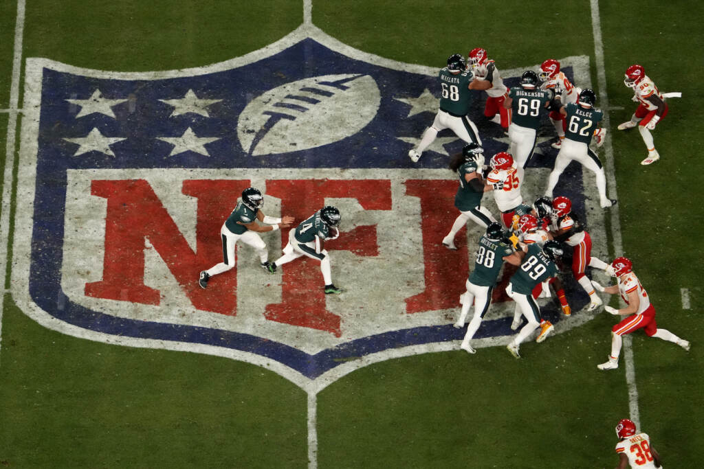 Super Bowl Football Philadelphia Eagles quarterback Jalen Hurts, left, hands off to running back Kenneth Gainwell during Super Bowl LVII