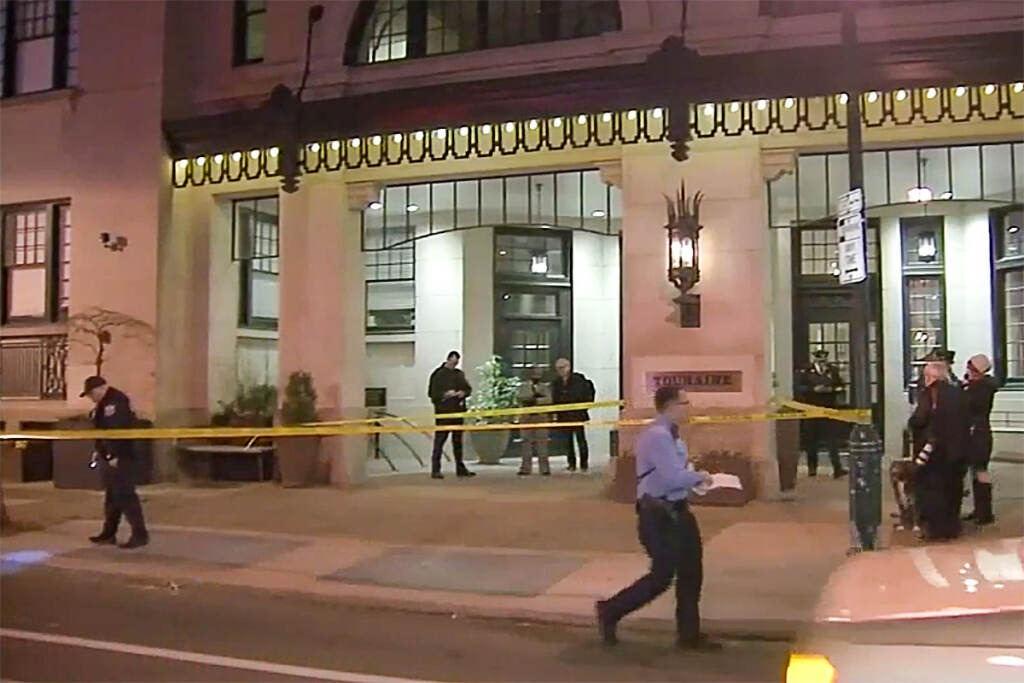 touraine-apartments-dog-fbi-shooting (1) The scene outside the Touraine apartment building in Rittenhouse Monday night after an off-duty FBI agent shot a dog.