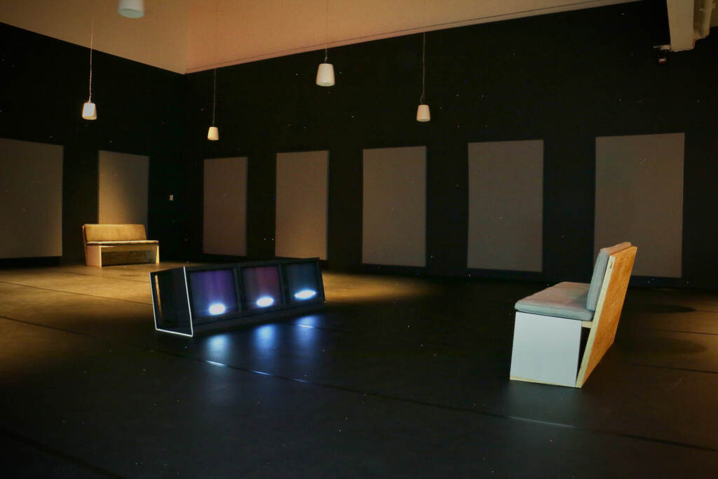 2023 03 16-e lee-philadelphia penn contemporary-carolyn lazard long take studio Carolyn Lazard,'s immersive exhibit, ''Long Take'' takes place in a darkened dance studio at the Institute of Contemporary Art. The sounds of dancing and verbal descriptions of the movements play from speakers while related words flash on and off on a trio of video screens. (Emma Lee/WHYY)