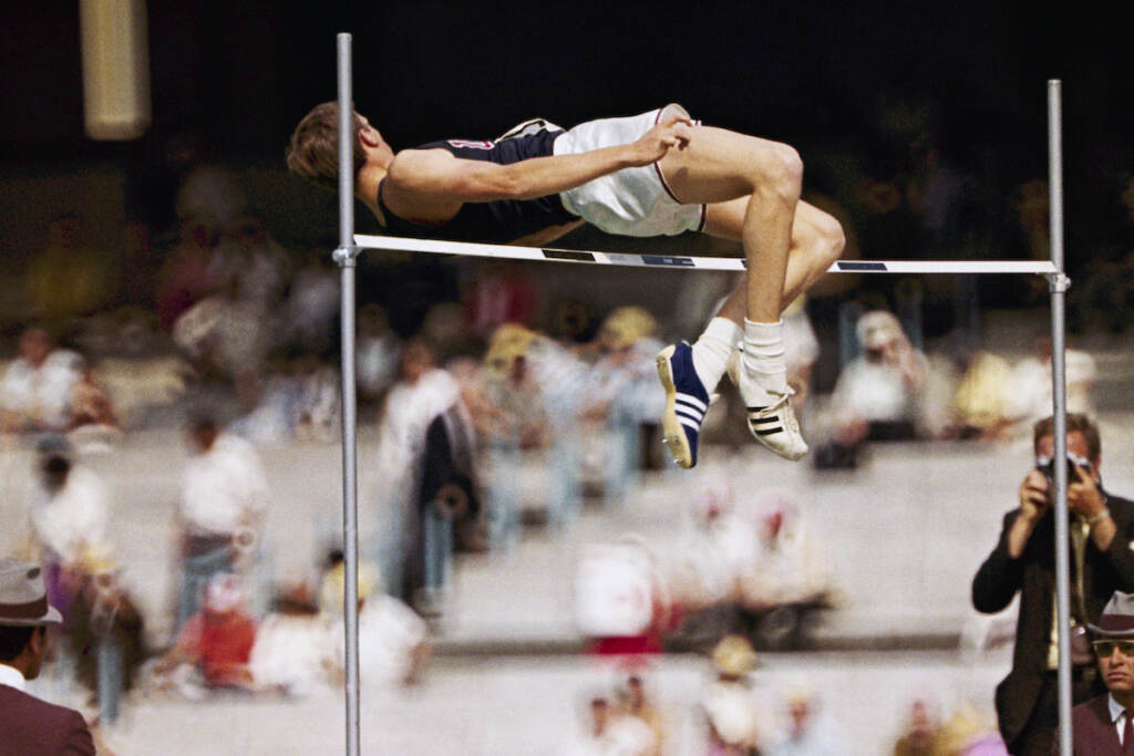 Dick Fosbury, of USA, clears the bar in the high-jump at the 1968 Mexico City Olympics