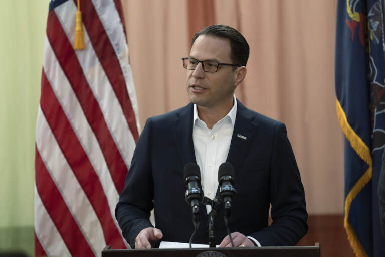 Gov. Josh Shapiro speaks at a podium.