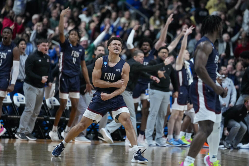 APTOPIX NCAA Fairleigh Dickinson Purdue Basketball Fairleigh Dickinson guard Grant Singleton (4) celebrates after a basket against Purdue in the second half of a first-round college basketball game in the men's NCAA Tournament in Columbus, Ohio