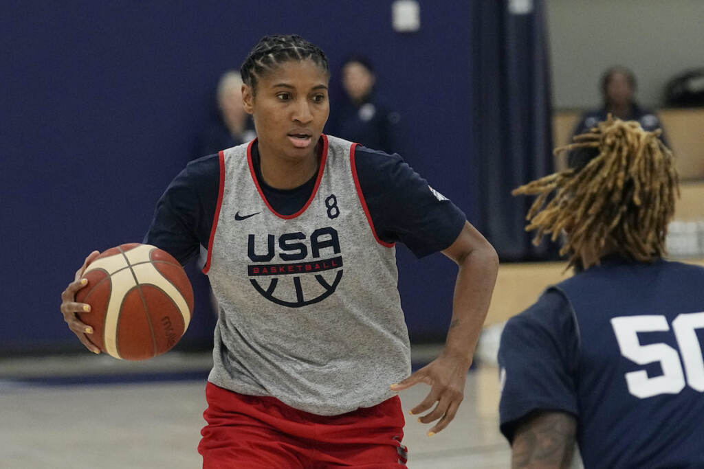 File photo: Team USA player Angel McCoughtry (8) drives during a spring training practice session, Friday, April 1, 2022, in Minneapolis