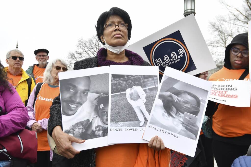 Gun Violence-Pennsylvania A woman holds photos of gun violence victims at a rally at the Pennsylvania Capitol pressing for stronger gun-control laws, Thursday, March 23, 2023, in Harrisburg, Pa.