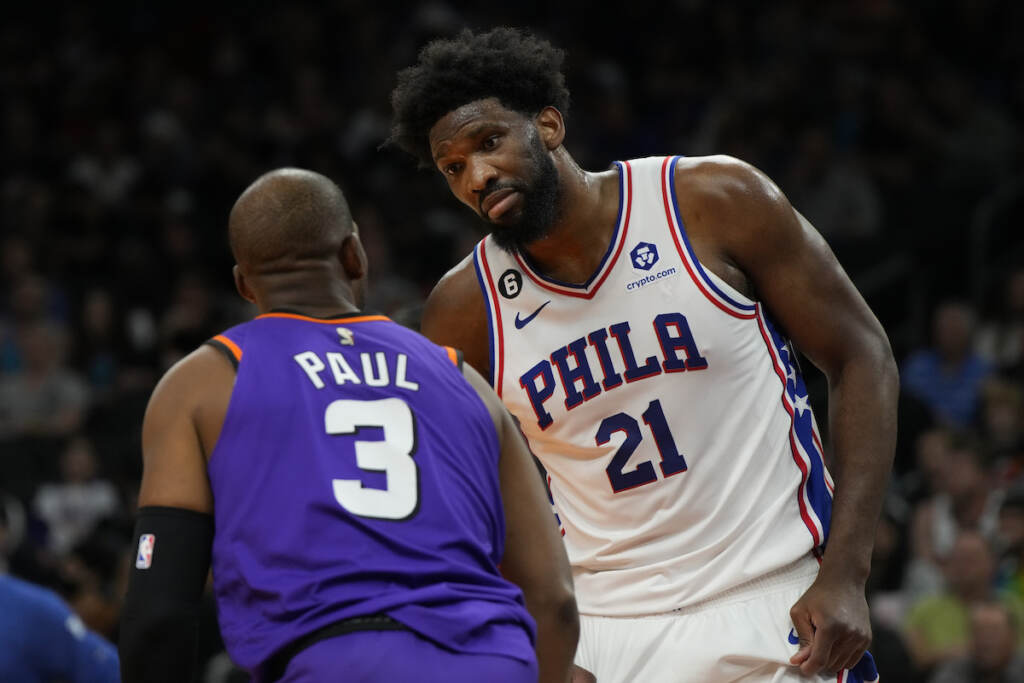 76ers Suns Basketball Phoenix Suns guard Chris Paul (3) and Philadelphia 76ers center Joel Embiid have words during the first half of an NBA basketball game Saturday, March 25, 2023, in Phoenix
