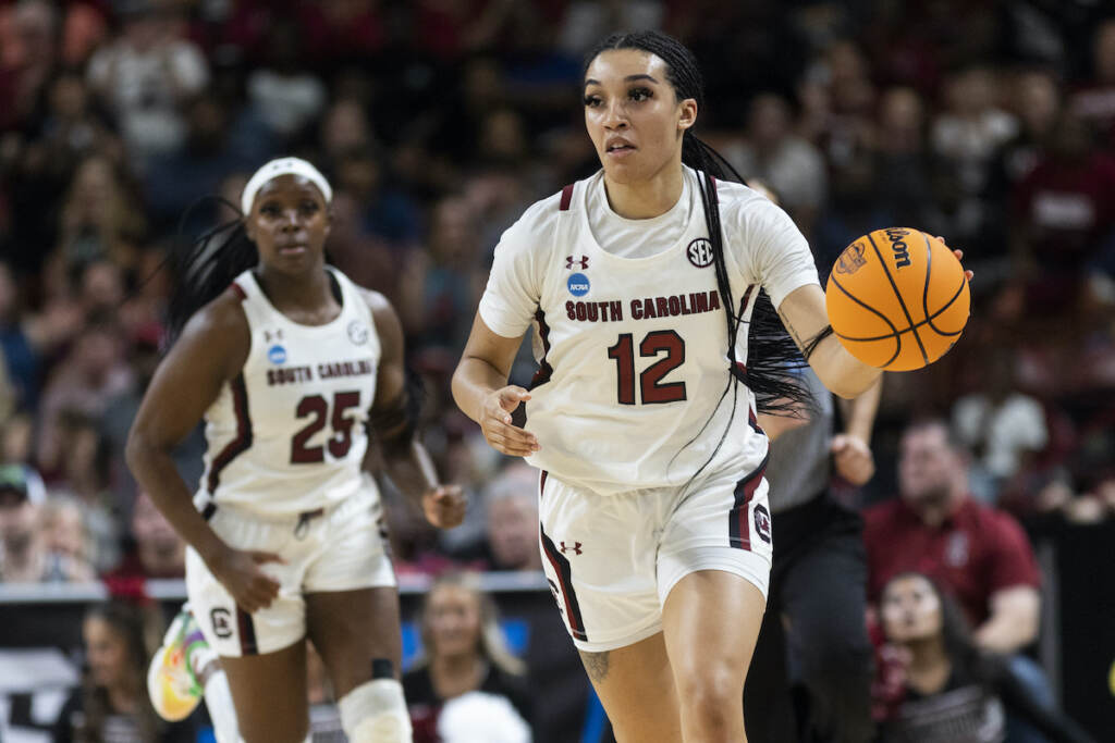 South Carolina's Brea Beal (12) brings the ball upcourt against Maryland in the second half of an Elite 8 college basketball game of the NCAA Tournament in Greenville