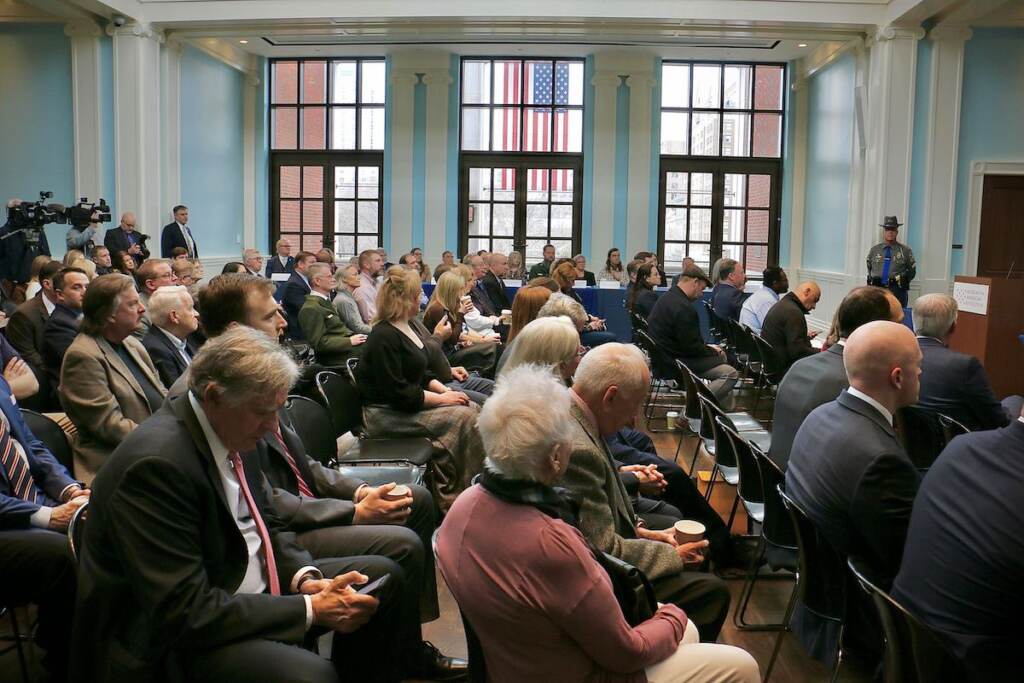 A crowd gathers at the Museum of the American Revolution to witness the return of 50 artifacts stolen from museums and historical societies in the 1970s