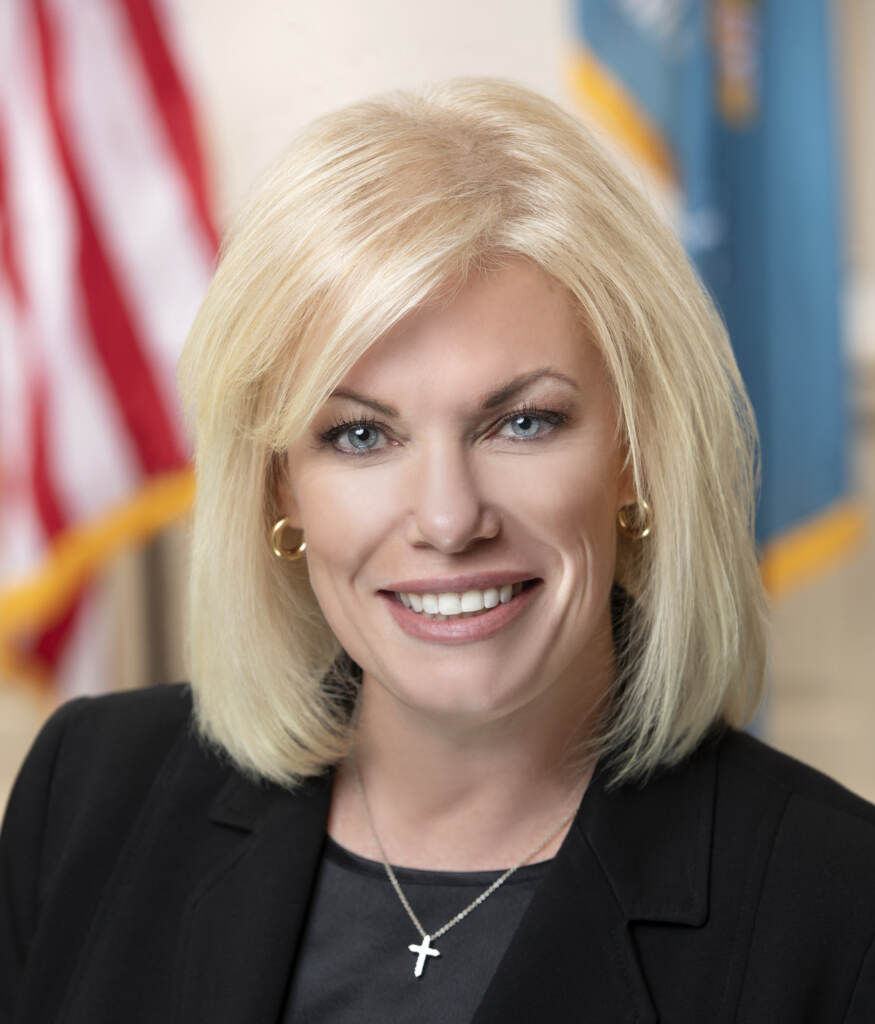 A headshot of State Sen. Nicole Poore, smiling.